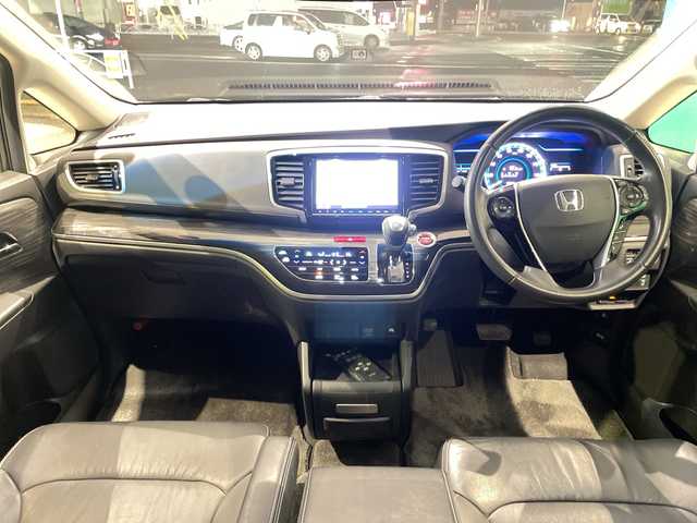 ホンダ オデッセイ ハイブリッド 福島県 2016(平28)年 15.1万km ホワイトオーキッドパール ワンオーナー車/純正SDナビ/〇フルセグTV/〇Bt/〇FM＆AM/〇SD/〇DISC（CD＆DVD）/〇リアモニタHDMI/バックカメラ/純正ETC/オートライト/ステアリングボタン/追従クルーズコントロール/純正フリップダウンモニター/リモコン/パワーシート（D席）/シートヒーター（D＋N席）/両面パワースライドドア/社外夏タイヤ4本積載（225/40R19）