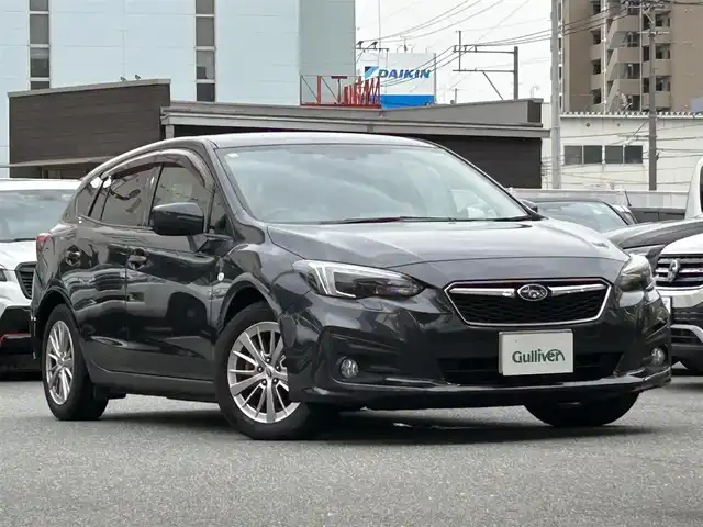 スバル インプレッサ スポーツ 1．6i－Lアイサイト 福岡県 2017(平29)年 6.1万km ダークグレーメタリック 純正ナビ（DVD・TV（フルセグ）・Bluetooth）/バックカメラ/クルーズコントロール（追跡あり）/ETC/純正アルミホイール/純正フロアマット/レーンキープアシスト/カーテンエアバック/エアバック（運転席・助手席・サイド）/LEDヘッドライト/フォグライプ/オートライト/横滑り防止装置/アイドリングストップ/盗難防止装置/パワーウィンド/衝撃被害軽減ブレーキ/USB入力端子/コーナーセンサー/ACCエアコン