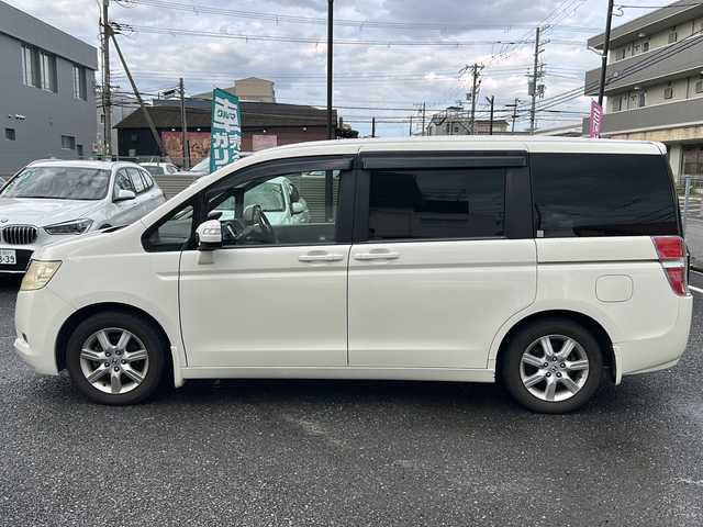 ホンダ ステップワゴン G Lパッケージ 大阪府 2009(平21)年 10万km プレミアムホワイトパール ETC/ドライブレコーダー/両側PWスライドドア/社外ナビ/ワンセグTV/革巻きステアリング/純正フロアマット