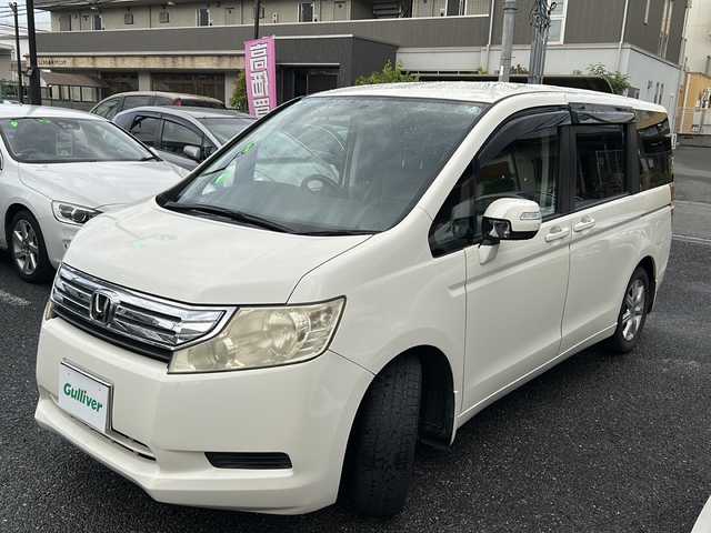 ホンダ ステップワゴン G Lパッケージ 大阪府 2009(平21)年 10万km プレミアムホワイトパール ETC/ドライブレコーダー/両側PWスライドドア/社外ナビ/ワンセグTV/革巻きステアリング/純正フロアマット