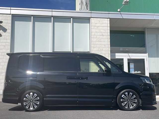 ホンダ ステップワゴン スパーダ eHEV プレミアムライン 香川県 2022(令4)年 6.6万km クリスタルブラックパール 無限エアロ（フロント　サイド　リア）/純正１１．４インチナビ/純正１５．６インチリアモニター/両側パワースライドドア/パワーバックドア/ＢＳＭ/シートヒーター/フルセグＴＶ/ＥＴＣ/コーナーセンサー/CD/DVD再生可能/レーダークルーズ