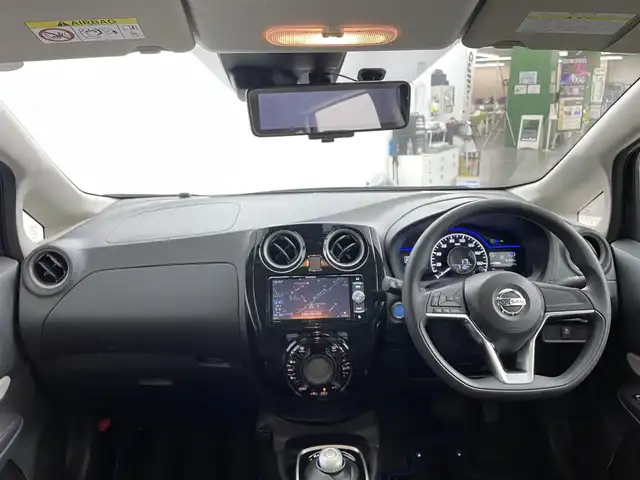 日産 ノート e－パワー X FOUR 道央・札幌 2019(令1)年 0.7万km インペリアルアンバーP ・ワンオーナー/・４WD/・社外SDナビ/　BT/フルセグ/CD/DVD/・アラウンドビューモニター/・インテリジェントルームミラー/・ETC/・エマージェンシーブレーキ/・レーンアシスト/・横滑り防止/・アイドリングストップ/・ステアリングスイッチ/・オートライト/・オートレベリング付きLEDヘッドライト/・前後コーナーセンサー/・社外ドライブレコーダー/・取扱説明書・保証書あり/・プッシュスタート/・純正アルミ付き冬タイヤ積込