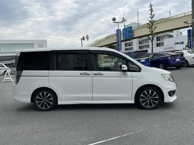 ホンダ ステップワゴン スパーダ Z クールスピリット 山梨県 2012(平24)年 9.2万km ホワイトオーキッドパール (株)IDOMが運営する【じしゃロン甲府店】の自社ローン専用車両になります。/こちらは現金またはオートローンご利用時の価格です。自社ローンご希望の方は別途その旨お申付け下さい/スマートキー２個/両側パワースライドドア/クルーズコントロール/パドルシフト/ハーフレザーシート/純正ＨＤＤインターナビ・フルセグＴＶ/ＣＤ・ＤＶＤ・ＵＳＢ/バックカメラ/ＨＩＤオートライト/ビルトインＥＴＣ/保証書・取説書・ナビ説