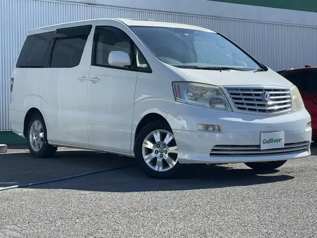 トヨタ アルファード Ｖ AX L－ED サイドリフトアップ 徳島県 2005(平17)年 11.9万km ホワイトパールマイカ サンルーフ/純正ナビ/（BT/CD/DVD/SD/フルセグTV）/バックカメラ/両側パワースライドドア/オートライト/ステアリングスイッチ/プッシュスタート/リモコンキー/スペアキー1本/後部コーナーセンサー/純正16インチアルミホイール