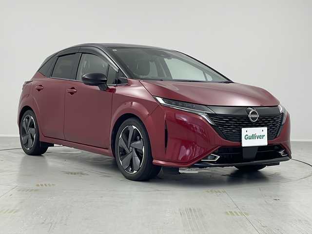 日産 オーラ G 茨城県 2021(令3)年 5万km ガーネットレッド/スーパーブラック 2トーン ＢＯＳＥサウンド　ワイヤレス充電器　ＵＳＢ端子　ビルトインＥＴＣ２．０　純正９型ナビ　フルセグＴＶ　全周囲カメラ　プロパイロット　アダプティブクルーズコントロール　ＬＥＤライト　純正アルミホイール
