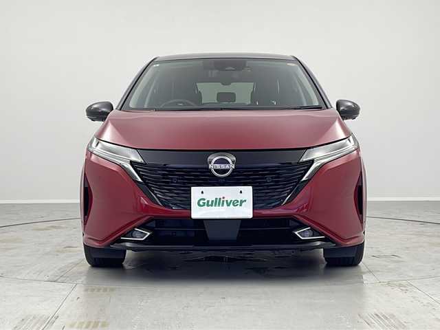 日産 オーラ G 茨城県 2021(令3)年 5万km ガーネットレッド/スーパーブラック 2トーン ＢＯＳＥサウンド　ワイヤレス充電器　ＵＳＢ端子　ビルトインＥＴＣ２．０　純正９型ナビ　フルセグＴＶ　全周囲カメラ　プロパイロット　アダプティブクルーズコントロール　ＬＥＤライト　純正アルミホイール