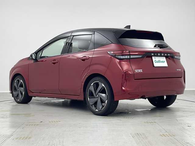 日産 オーラ G 茨城県 2021(令3)年 5万km ガーネットレッド/スーパーブラック 2トーン ＢＯＳＥサウンド　ワイヤレス充電器　ＵＳＢ端子　ビルトインＥＴＣ２．０　純正９型ナビ　フルセグＴＶ　全周囲カメラ　プロパイロット　アダプティブクルーズコントロール　ＬＥＤライト　純正アルミホイール