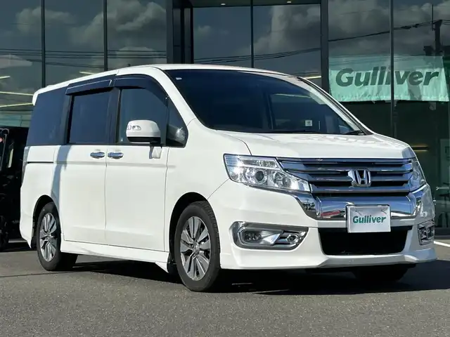 ホンダ ステップワゴン スパーダ Z インターナビセレ 鹿児島県 2012(平24)年 9.5万km ホワイトオーキッドパール ドライブレコーダー/純正HDDナビ/フルセグテレビ/CD/DVD/後部座席モニター有り/バックカメラ/両側パワースライドドア/クルーズコントロール/格納サードシート/純正16インチアルミホイール/オートライト/アイドリングストップ/ETC