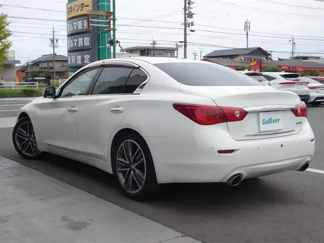 日産 スカイライン 200GT－t タイプSP 静岡県 2014(平26)年 9.5万km クリスタルホワイトパール ワンオーナー/純正メーカーナビ/CD/DVD/BT/MusicBoX/AUX/USB/フルセグTV/ビルトインETC/純正前方ドライブレコーダー/全方位運転支援システム/　車線逸脱防止支援システム/　車線逸脱警報/　後側方衝突防止支援システム/　後側方車両検知平警報　/　後退時衝突防止システム/　前方衝突予測警報/　エマージェンシーブレーキ/　インテリジェントクルーズコントロール/　インテリジェントペダル/　アラウンドビューモニタ/　フロント/バックソナー/前席パワーシート/シートヒーター/純正LEDヘッドライト/純正フロアマット/スマートキー2個/取扱説明書/保証書