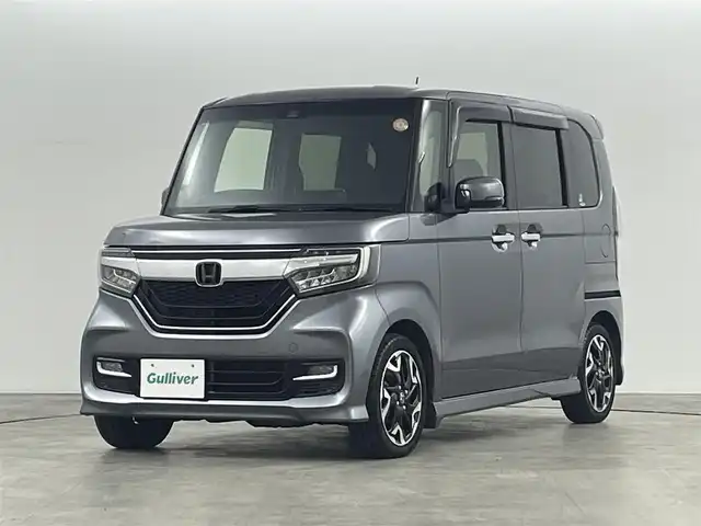ホンダ Ｎ ＢＯＸ カスタム G L ターボ ホンダセンシング 福島県 2019(令1)年 5万km シャイニンググレーM ホンダセンシング/・先行車発進お知らせ機能/・路線逸脱防止機能/・レーンキープアシスト/・表札認識機能/・衝突被害軽減システム/・盗難防止装置/純正7インチSDナビ/・ワンセグ/TV/BT/CD/DVD/USB/AM/FM/バックカメラ/両側パワースライドドア/ACC/LEDオートライト/・フォグランプ/ハーフレザーシート/・ベンチシート/純正アルミホイール付きサマータイヤ/レザーハンドル/・ステアリングリモコン/パドルシフト/アイドリングストップ/電動格納ミラー/・ウィンカーミラー/ETC/ドアバイザー/純正フロアマット/プッシュスタート/・スマートキー