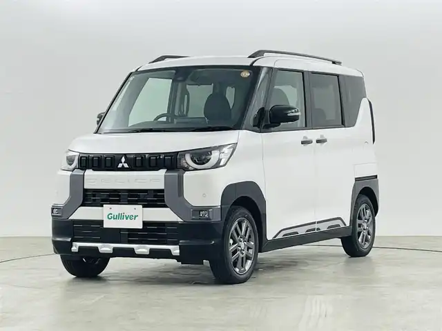 三菱 デリカミニ T プレミアム 福島県 2025(令7)年 0.1万km未満 アメジストブラック/シルキーホワイト 届出済未使用品/マイパイロット/・先行車発進告知/・車線警報/・車線逸脱防止/・衝突軽減ブレーキ/・標識認識機能/・クリアランスソナー/純正ディスプレイオーディオ/・Bluetooth/AM/FM/・アラウンドビューモニター/両側パワースライドドア/・ハンズフリーオートスライド/アイドリングストップ/4WD/・ダウンヒルアシストコントロール/電子パーキング/革巻きステアリング/・ステアリングリモコン/・ステアリングヒーター/ハーフレザーシート/・シートヒーター(運転席/助手席)/プッシュスタート/・スマートキー/・スペアキー/LEDヘッドライト/・オートライト/・フォグライト/ルーフレール/電動格納ミラー/取扱説明書