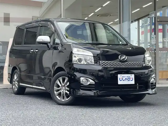 トヨタ ヴォクシー ZS 煌Z 岐阜県 2013(平25)年 12万km ブラック (株)IDOMが運営する【じしゃロン多治見店】の自社ローン専用車両になります。こちらは現金またはオートローンご利用時の価格です。自社ローンご希望の方は別途その旨お申付け下さい。/ディーラーオプションナビ/　（Bluetooth/DVD/フルセグ）/両側パワースライドドア/バックカメラ/ETC/オートライト/フォグランプ/ステアリングリモコン/パドルシフト
