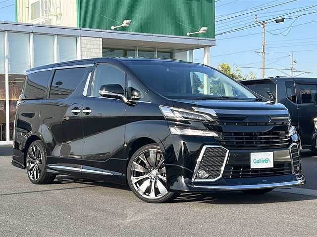 トヨタ ヴェルファイア Z 香川県 2015(平27)年 7万km ブラック 〇モデリスタエアロ/〇社外20インチAW/〇ツインムーンルーフ/〇フリップダウンモニター/〇パワースライドドア（両側）/〇純正ナビ/〇フルセグTV/〇Bluetooth/〇バックカメラ/〇ビルトインETC/○クリアランスソナー/バックソナー/〇LEDヘッドランプ/〇オートライト/〇フォグランプ/〇革巻きステアリングホイール/〇ハンドルカバー取付/〇前後左右独立温度調整オートエアコン/○シートカバー取付/〇スマートエントリー/プッシュスタート/〇禁煙車