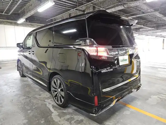 トヨタ ヴェルファイア Z 香川県 2015(平27)年 7万km ブラック 〇モデリスタエアロ/〇社外20インチAW/〇ツインムーンルーフ/〇フリップダウンモニター/〇パワースライドドア（両側）/〇純正ナビ/〇フルセグTV/〇Bluetooth/〇バックカメラ/〇ビルトインETC/○クリアランスソナー/バックソナー/〇LEDヘッドランプ/〇オートライト/〇フォグランプ/〇革巻きステアリングホイール/〇ハンドルカバー取付/〇前後左右独立温度調整オートエアコン/○シートカバー取付/〇スマートエントリー/プッシュスタート/〇禁煙車