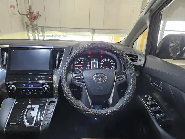 トヨタ ヴェルファイア Z 香川県 2015(平27)年 7万km ブラック 〇モデリスタエアロ/〇社外20インチAW/〇ツインムーンルーフ/〇フリップダウンモニター/〇パワースライドドア（両側）/〇純正ナビ/〇フルセグTV/〇Bluetooth/〇バックカメラ/〇ビルトインETC/○クリアランスソナー/バックソナー/〇LEDヘッドランプ/〇オートライト/〇フォグランプ/〇革巻きステアリングホイール/〇ハンドルカバー取付/〇前後左右独立温度調整オートエアコン/○シートカバー取付/〇スマートエントリー/プッシュスタート/〇禁煙車