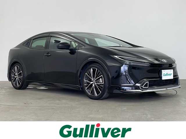 トヨタ プリウス Z 鹿児島県 2023(令5)年 2.7万km アティチュードブラックマイカ 全方位カメラ/純正ナビ付ディスプレイオーディオ/（フルセグ/Bluetooth）/モデリスタエアロ（フロント/サイド/リア）/ビルドインETC2.0/デジタルインナーミラー/パノラミックビューモニター/合皮レザーシート/パワーシート/シートヒーター/シートメモリー/トヨタセーフティーセンス/レーダークルーズコントロール/レーンキープアシスト/パワーバックドア/ワイヤレス充電/AC１００V/ブラインドスポットモニター/オートライト/オートマチックハイビーム/LEDヘッドライト/ステアリングスイッチ
