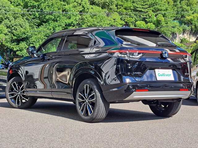 ホンダ ヴェゼル ハイブリッド e:HEV Z 大阪府 2023(令5)年 2.3万km クリスタルブラックパール /禁煙車//ワンオーナー車//HondaCONNECTディスプレイ/・ナビ機能・フルセグ・BT・FM・AM・USB・スマホ連携//ビルトインETC2.0//ワイヤレス充電//ディーラーオプション前後ドラレコ//TVキット//ハーフレザーシート//運転席・助手席シートヒーター//ステアリングヒーター//ハンズフリーパワーバックドア//LEDシーケンシャルウィンカー//フルLEDヘッドライト//そよ風アウトレット//電動パーキングブレーキ//ヒルディセントコントロール//アダプティブクルーズコントロール//アダプティブハイビーム//ブラインドスポットインフォメーション//保証書//取扱説明書//スマートキー