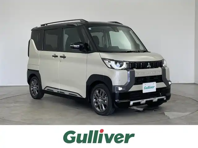 三菱 デリカミニ T プレミアム 埼玉県 2025(令7)年 0.1千km ベージュⅡ 届出済未使用車　/純正９インチディスプレイオーディオ　/マルチアラウンドモニター　/マイパイロット　/レーダークルーズコントロール　/デジタルインナーミラー　/シートヒーター　/ステアリングヒーター　/ＨＤＭＩ