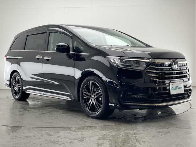 ホンダ オデッセイ ハイブリッド e:HEVアブソルート EX 宮崎県 2021(令3)年 4.4万km プレミアムスパークルブラックパール Honda SENSING/〇衝突軽減ブレーキ/〇誤発進抑制機能(前方・後方)/〇近距離衝突軽減ブレーキ/〇急アクセル抑制機能/〇路外逸脱抑制機能/〇歩行者事故低減ステアリング/〇車線維持支援システム/〇標識認識機能/〇先行車発進お知らせ機能/〇渋滞追従機能付きアダプティブクルーズコントロール/〇ブラインドスポットインフォメーション/〇コーナーセンサー/〇後退出庫サポート/純正10インチSDナビ/フルセグTV/CD/DVD/Bluetooth/マルチビューカメラシステム/純正11.6インチ後席フリップダウンモニター（VM-185EN）/両側パワースライドドア/ハーフレザーシート/パワーシート/シートヒーター/ハンズフリーアクセスパワーテールゲート/LEDヘッドライト/ビルトインETC2.0/純正18インチAW/スマートキー×2/保証書/取扱説明書