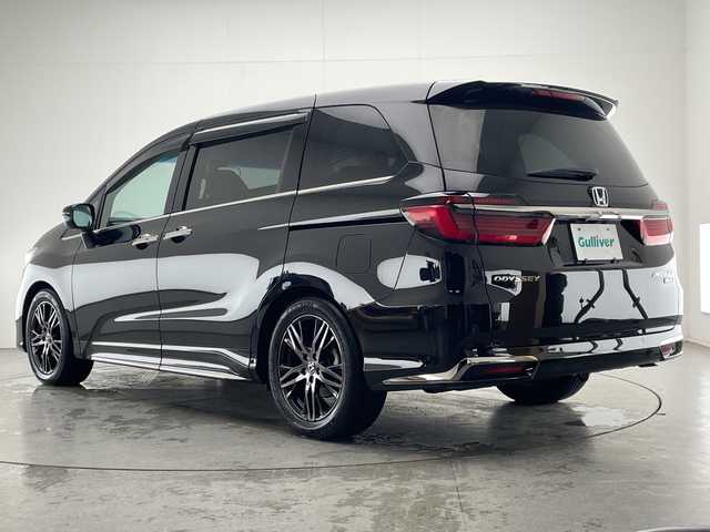 ホンダ オデッセイ ハイブリッド e:HEVアブソルート EX 宮崎県 2021(令3)年 4.4万km プレミアムスパークルブラックパール Honda SENSING/〇衝突軽減ブレーキ/〇誤発進抑制機能(前方・後方)/〇近距離衝突軽減ブレーキ/〇急アクセル抑制機能/〇路外逸脱抑制機能/〇歩行者事故低減ステアリング/〇車線維持支援システム/〇標識認識機能/〇先行車発進お知らせ機能/〇渋滞追従機能付きアダプティブクルーズコントロール/〇ブラインドスポットインフォメーション/〇コーナーセンサー/〇後退出庫サポート/純正10インチSDナビ/フルセグTV/CD/DVD/Bluetooth/マルチビューカメラシステム/純正11.6インチ後席フリップダウンモニター（VM-185EN）/両側パワースライドドア/ハーフレザーシート/パワーシート/シートヒーター/ハンズフリーアクセスパワーテールゲート/LEDヘッドライト/ビルトインETC2.0/純正18インチAW/スマートキー×2/保証書/取扱説明書