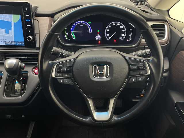 ホンダ オデッセイ ハイブリッド e:HEVアブソルート EX 宮崎県 2021(令3)年 4.4万km プレミアムスパークルブラックパール Honda SENSING/〇衝突軽減ブレーキ/〇誤発進抑制機能(前方・後方)/〇近距離衝突軽減ブレーキ/〇急アクセル抑制機能/〇路外逸脱抑制機能/〇歩行者事故低減ステアリング/〇車線維持支援システム/〇標識認識機能/〇先行車発進お知らせ機能/〇渋滞追従機能付きアダプティブクルーズコントロール/〇ブラインドスポットインフォメーション/〇コーナーセンサー/〇後退出庫サポート/純正10インチSDナビ/フルセグTV/CD/DVD/Bluetooth/マルチビューカメラシステム/純正11.6インチ後席フリップダウンモニター（VM-185EN）/両側パワースライドドア/ハーフレザーシート/パワーシート/シートヒーター/ハンズフリーアクセスパワーテールゲート/LEDヘッドライト/ビルトインETC2.0/純正18インチAW/スマートキー×2/保証書/取扱説明書