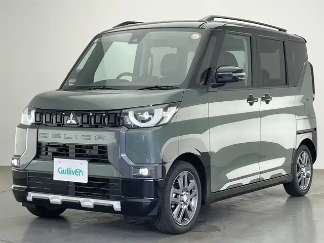 三菱 デリカミニ T プレミアム 愛知県 2025(令7)年 0.1万km未満 緑Ⅱ 届出済未使用車　純正９型ＤＡ　カープレイ　マイパイロット　全方位カメラ　デジタルインナーミラー　ツートン　ハンズフリ両側パワスラ　ハーフレザー　シートヒーター eーアシスト　衝突軽減　追従クルコン パドルシフト　ＬＥＤオートライト　フォグランプ　ルーフレール　禁煙車/T　PREMIUM　9型ディスプレイオーディオ/（121/330）/サイドデカール（33/440）