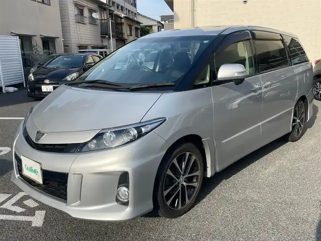 トヨタ エスティマ アエラス 広島県 2015(平27)年 5.3万km シルバーM /登録時走行距離/　　　　　　　52347キロ/ワンオーナー/社外ナビ/地デジ/両側パワースライドドア/オートライト/スペアキー×１/ビルトインETC/新車時整備手帳/　　【保証書】/取扱説明書/
