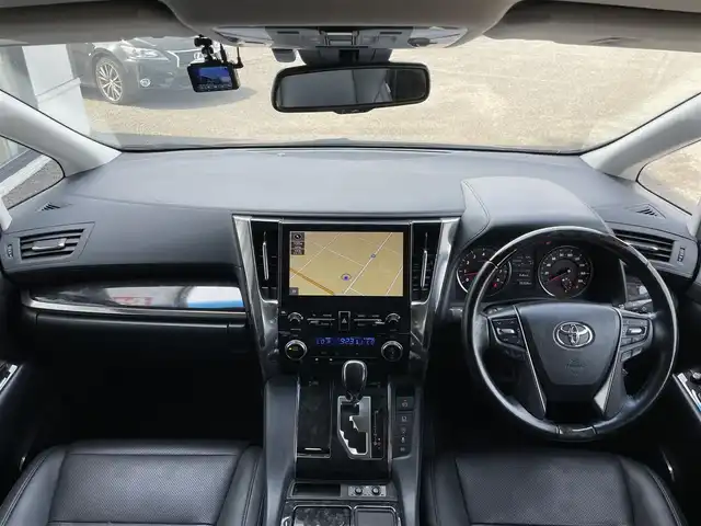 トヨタ アルファード SC 道央・札幌 2020(令2)年 7.3万km ダークレッドマイカメタリック ４WD/JBLプレミアムサウンドシステム/純正ディーラーOPナビ/CD/DVD/BT/フルセグ/純正フリップダウンモニター/トヨタセーフティセンス/プリクラッシュセーフティ/横滑り防止装置/レーダークルーズコントロール/レーンキープアシスト/パーキングアシスト/クリアランスソナー/ブラインドスポットモニター/パーキングサポートブレーキ/リアクロストラフィックアラート/ロードサインアシスト/パノラミックビューモニター/ビルトインETC2.0/ドライブレコーダー/アイドリングストップ/自動防眩ミラー/両側パワースライドドア/パワーバックドア/前席/２列目パワーシート/前席シートヒーター/前席エアシート/D席メモリーシート/N席/２列目オットマン/レザーシート/ステアリングリモコン/ハンドルヒーター/電動パーキング/ブレーキホールド/AC100V/プッシュスタート/スマートキー/LEDヘッドライト/オートライト/オートハイビーム/フォグランプ/電動格納ミラー/ウィンカーミラー/純正フロアマット/ドアバイザー