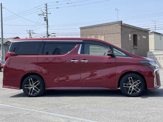 トヨタ アルファード SC 道央・札幌 2020(令2)年 7.3万km ダークレッドマイカメタリック ４WD/JBLプレミアムサウンドシステム/純正ディーラーOPナビ/CD/DVD/BT/フルセグ/純正フリップダウンモニター/トヨタセーフティセンス/プリクラッシュセーフティ/横滑り防止装置/レーダークルーズコントロール/レーンキープアシスト/パーキングアシスト/クリアランスソナー/ブラインドスポットモニター/パーキングサポートブレーキ/リアクロストラフィックアラート/ロードサインアシスト/パノラミックビューモニター/ビルトインETC2.0/ドライブレコーダー/アイドリングストップ/自動防眩ミラー/両側パワースライドドア/パワーバックドア/前席/２列目パワーシート/前席シートヒーター/前席エアシート/D席メモリーシート/N席/２列目オットマン/レザーシート/ステアリングリモコン/ハンドルヒーター/電動パーキング/ブレーキホールド/AC100V/プッシュスタート/スマートキー/LEDヘッドライト/オートライト/オートハイビーム/フォグランプ/電動格納ミラー/ウィンカーミラー/純正フロアマット/ドアバイザー