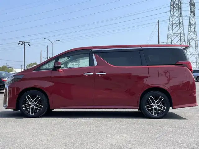 トヨタ アルファード SC 道央・札幌 2020(令2)年 7.3万km ダークレッドマイカメタリック ４WD/JBLプレミアムサウンドシステム/純正ディーラーOPナビ/CD/DVD/BT/フルセグ/純正フリップダウンモニター/トヨタセーフティセンス/プリクラッシュセーフティ/横滑り防止装置/レーダークルーズコントロール/レーンキープアシスト/パーキングアシスト/クリアランスソナー/ブラインドスポットモニター/パーキングサポートブレーキ/リアクロストラフィックアラート/ロードサインアシスト/パノラミックビューモニター/ビルトインETC2.0/ドライブレコーダー/アイドリングストップ/自動防眩ミラー/両側パワースライドドア/パワーバックドア/前席/２列目パワーシート/前席シートヒーター/前席エアシート/D席メモリーシート/N席/２列目オットマン/レザーシート/ステアリングリモコン/ハンドルヒーター/電動パーキング/ブレーキホールド/AC100V/プッシュスタート/スマートキー/LEDヘッドライト/オートライト/オートハイビーム/フォグランプ/電動格納ミラー/ウィンカーミラー/純正フロアマット/ドアバイザー