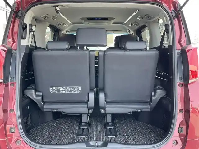 トヨタ アルファード SC 道央・札幌 2020(令2)年 7.3万km ダークレッドマイカメタリック ４WD/JBLプレミアムサウンドシステム/純正ディーラーOPナビ/CD/DVD/BT/フルセグ/純正フリップダウンモニター/トヨタセーフティセンス/プリクラッシュセーフティ/横滑り防止装置/レーダークルーズコントロール/レーンキープアシスト/パーキングアシスト/クリアランスソナー/ブラインドスポットモニター/パーキングサポートブレーキ/リアクロストラフィックアラート/ロードサインアシスト/パノラミックビューモニター/ビルトインETC2.0/ドライブレコーダー/アイドリングストップ/自動防眩ミラー/両側パワースライドドア/パワーバックドア/前席/２列目パワーシート/前席シートヒーター/前席エアシート/D席メモリーシート/N席/２列目オットマン/レザーシート/ステアリングリモコン/ハンドルヒーター/電動パーキング/ブレーキホールド/AC100V/プッシュスタート/スマートキー/LEDヘッドライト/オートライト/オートハイビーム/フォグランプ/電動格納ミラー/ウィンカーミラー/純正フロアマット/ドアバイザー