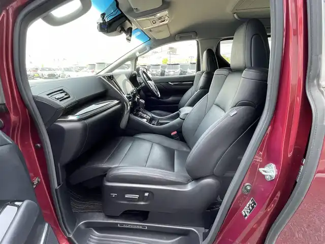 トヨタ アルファード SC 道央・札幌 2020(令2)年 7.3万km ダークレッドマイカメタリック ４WD/JBLプレミアムサウンドシステム/純正ディーラーOPナビ/CD/DVD/BT/フルセグ/純正フリップダウンモニター/トヨタセーフティセンス/プリクラッシュセーフティ/横滑り防止装置/レーダークルーズコントロール/レーンキープアシスト/パーキングアシスト/クリアランスソナー/ブラインドスポットモニター/パーキングサポートブレーキ/リアクロストラフィックアラート/ロードサインアシスト/パノラミックビューモニター/ビルトインETC2.0/ドライブレコーダー/アイドリングストップ/自動防眩ミラー/両側パワースライドドア/パワーバックドア/前席/２列目パワーシート/前席シートヒーター/前席エアシート/D席メモリーシート/N席/２列目オットマン/レザーシート/ステアリングリモコン/ハンドルヒーター/電動パーキング/ブレーキホールド/AC100V/プッシュスタート/スマートキー/LEDヘッドライト/オートライト/オートハイビーム/フォグランプ/電動格納ミラー/ウィンカーミラー/純正フロアマット/ドアバイザー