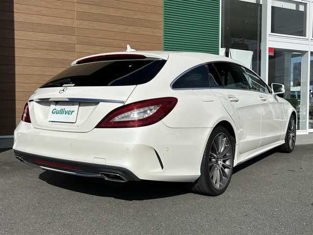 メルセデス・ベンツ ＣＬＳ２２０ｄ SブレイクAMGライン　 静岡県 2017(平29)年 3.7万km ダイヤモンドホワイト 純正ナビ（ワンセグTV/BT/CD）/サンルーフ/黒革レザーシート/パワーバックドア/アダプティブクルーズコントロール/ビルトインＥＴＣ/パドルシフト/Ｄ＋Ｎ席シートヒーター/Ｄ＋Ｎ席パワーシート/D＋N席メモリーシート/アクティブエマージェンシーストップアシスト/アクティブレーンチェンジアシスト/純正アルミホイール(19インチ)/保障証/取扱説明書