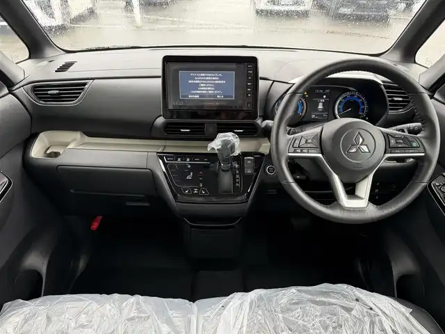 三菱 デリカミニ T プレミアム 東京都 2025(令7)年 0.1千km ベージュⅡ 登録済未使用車/純正ディスプレイオーディオ/デジタルインナーミラー/フロントフォグランプ/シートヒーター/ステアリングヒーター/プッシュスタート/キーレスエントリー/純正アルミホイール/両側パワースライドドア/パドルシフト/Bluetooth/アラウンドビューモニター/LEDヘッドライト/取扱説明書/新車保証書