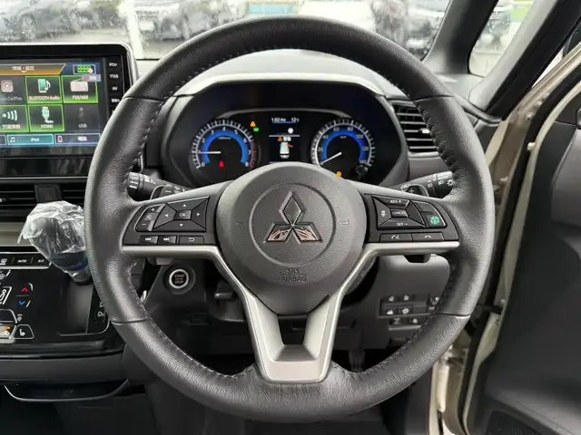 三菱 デリカミニ T プレミアム 東京都 2025(令7)年 0.1千km ベージュⅡ 登録済未使用車/純正ディスプレイオーディオ/デジタルインナーミラー/フロントフォグランプ/シートヒーター/ステアリングヒーター/プッシュスタート/キーレスエントリー/純正アルミホイール/両側パワースライドドア/パドルシフト/Bluetooth/アラウンドビューモニター/LEDヘッドライト/取扱説明書/新車保証書