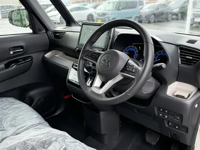 三菱 デリカミニ T プレミアム 東京都 2025(令7)年 0.1千km ベージュⅡ 登録済未使用車/純正ディスプレイオーディオ/デジタルインナーミラー/フロントフォグランプ/シートヒーター/ステアリングヒーター/プッシュスタート/キーレスエントリー/純正アルミホイール/両側パワースライドドア/パドルシフト/Bluetooth/アラウンドビューモニター/LEDヘッドライト/取扱説明書/新車保証書