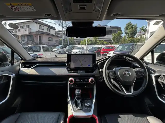 トヨタ ＲＡＶ４ アドベンチャー オフロードPKGⅡ 熊本県 2023(令5)年 5.9万km アティチュードブラックマイカ 4WD/純正ディスプレイオーディオ(ナビ機能付き)/【フルセグTV/USB/Bluetooth】/バックカメラ/デジタルインナーミラー/衝突被害軽減システム/レーダークルーズコントロール/レーンキープアシスト/ダウンヒルアシストコントロール/車両接近通報装置/コーナーセンサー/合皮シート/パワーシート(D席)/前席シートヒータ/前席エアシート/ハンドルヒーター/ルーフレール/純正18インチアルミホイール/オートLEDライト/オートマチックハイビーム/ビルトインETC2.0/横滑り防止装置/盗難防止装置/ダブル＋サイドエアバック/プッシュスタート/スマートキー/スペアキー/取扱説明書/保証書
