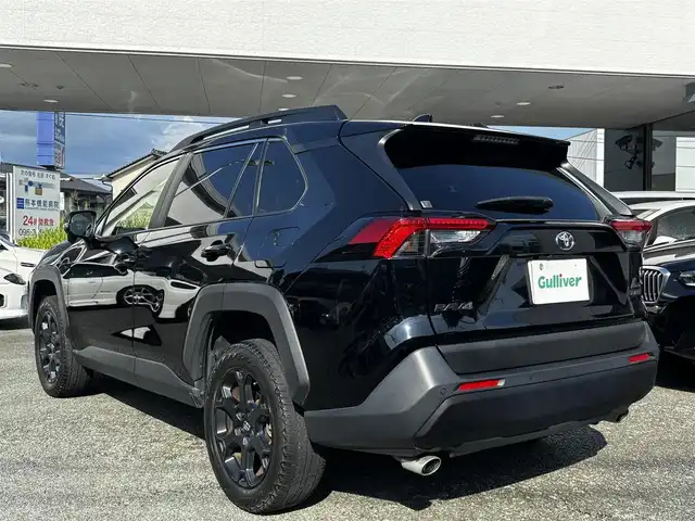 トヨタ ＲＡＶ４ アドベンチャー オフロードPKGⅡ 熊本県 2023(令5)年 5.9万km アティチュードブラックマイカ 4WD/純正ディスプレイオーディオ(ナビ機能付き)/【フルセグTV/USB/Bluetooth】/バックカメラ/デジタルインナーミラー/衝突被害軽減システム/レーダークルーズコントロール/レーンキープアシスト/ダウンヒルアシストコントロール/車両接近通報装置/コーナーセンサー/合皮シート/パワーシート(D席)/前席シートヒータ/前席エアシート/ハンドルヒーター/ルーフレール/純正18インチアルミホイール/オートLEDライト/オートマチックハイビーム/ビルトインETC2.0/横滑り防止装置/盗難防止装置/ダブル＋サイドエアバック/プッシュスタート/スマートキー/スペアキー/取扱説明書/保証書