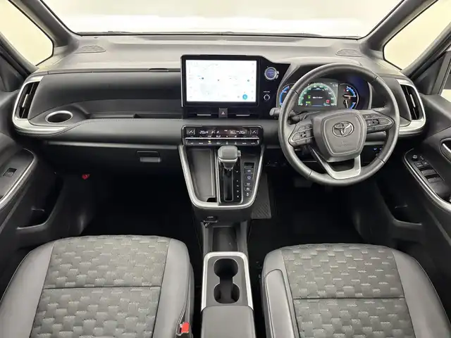 トヨタ ヴォクシー ハイブリッド S－Z 福岡県 2022(令4)年 3.1万km ホワイトパールクリスタルシャイン ワンオーナー　/１４型後席モニター　/純正１０．５型ＤＡナビ　/バックカメラ　/ビルトインＥＴＣ２．０　/レーダークルーズコントロール　/コーナーセンサー　/衝突被害軽減ブレーキ　/アクセル踏み間違い防止　/両側電動スライドドア　/シートヒーター　/ハーフレザーシート　/純正１７インチアルミホイール　/ＬＥＤヘッドライト