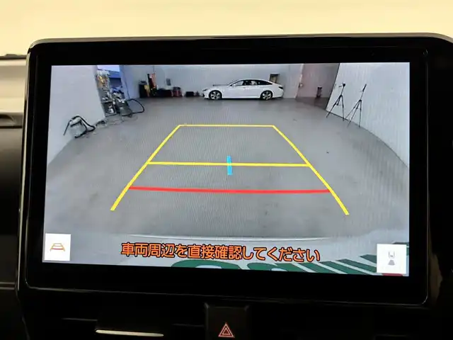 トヨタ ヴォクシー ハイブリッド S－Z 福岡県 2022(令4)年 3.1万km ホワイトパールクリスタルシャイン ワンオーナー　/１４型後席モニター　/純正１０．５型ＤＡナビ　/バックカメラ　/ビルトインＥＴＣ２．０　/レーダークルーズコントロール　/コーナーセンサー　/衝突被害軽減ブレーキ　/アクセル踏み間違い防止　/両側電動スライドドア　/シートヒーター　/ハーフレザーシート　/純正１７インチアルミホイール　/ＬＥＤヘッドライト
