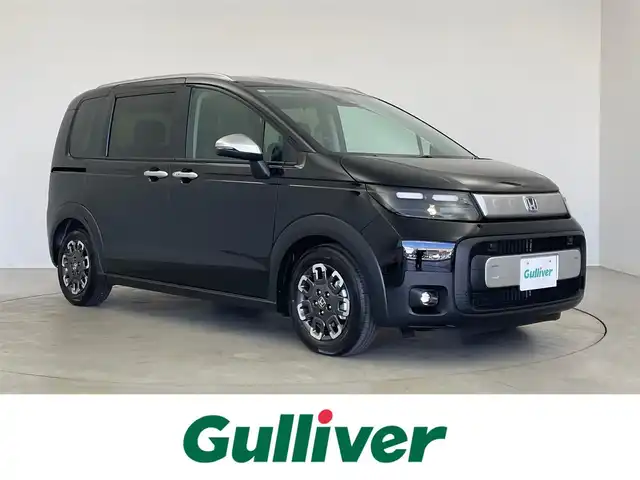 ホンダ フリード ハイブリット e:HEV クロスター 埼玉県 2025(令7)年 0.1千km クリスタルブラックパール 登録済未使用車/純正9インチナビ/ 地デジTV Bluetooth CarPlay/バックカメラ/ホンダセンシング/衝突軽減ブレーキ/レーンキープアシスト/レーダークルーズコントロール/ブラインドスポットモニター/クリアランスソナー/両側パワースライドドア/シートヒーター/LEDオートライト