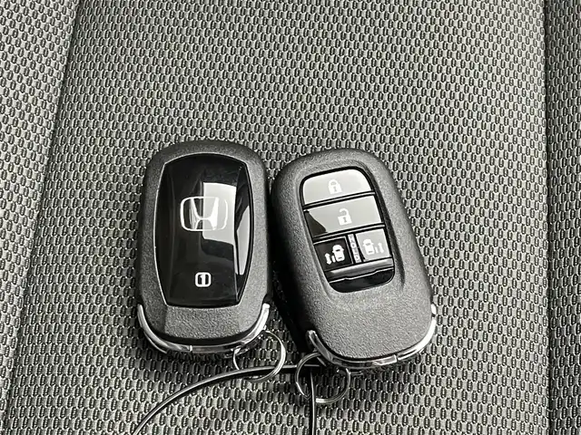 ホンダ フリード ハイブリット e:HEV クロスター 埼玉県 2025(令7)年 0.1千km クリスタルブラックパール 登録済未使用車/純正9インチナビ/ 地デジTV Bluetooth CarPlay/バックカメラ/ホンダセンシング/衝突軽減ブレーキ/レーンキープアシスト/レーダークルーズコントロール/ブラインドスポットモニター/クリアランスソナー/両側パワースライドドア/シートヒーター/LEDオートライト