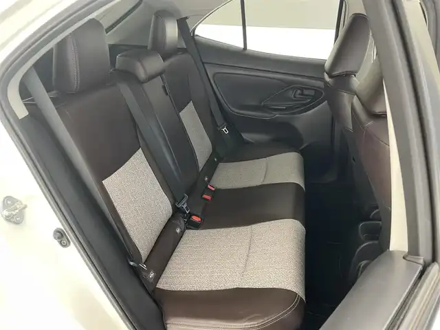 トヨタ ヤリスクロス ハイブリッド Z 愛知県 2021(令3)年 5.6万km ホワイトパールクリスタルシャイン 純正８型ナビ　全方位カメラ　ＢＳＭ　禁煙　追従クルコン　茶ハーフレザー　ＥＴＣ　セーフティセンス　シートヒーター　コーナーセンサー　ＬＥＤオートライト　パワーシート　衝突軽減　車線逸脱　電子パーキング　Bluetooth　USB接続　オートハイビーム　パノラミックビューモニター　純正１８インチAW　プッシュスタート　スマートキー