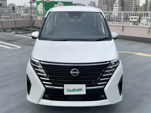 日産 セレナ e－パワー ルキシオン 東京都 2025(令7)年 0.3万km プリズムホワイト ワンオーナー/ニッサンコネクティッドナビ（BT/地デジTV)/アラウンドビューモニター/プロパイロット2.0/黒皮シート/足元イルミパック/フロアカーペットパッケージ/100V電源/シートヒーター（一列目/二列目）/ステリングヒーター/車内カーテン/カーアラームスタンダード/純正16インチアルミ/ビルトインETC2.0/シートヒーター（一列目/二列目）/デジタルインナーミラー/ヘッドアップディスプレイ/純正フロアマット/スペアキー1本/保証書