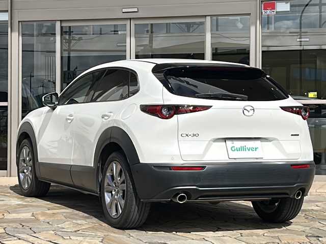 マツダ ＣＸ－３０ 20S Lパッケージ 静岡県 2020(令2)年 3.8万km スノーフレイクホワイトパールマイカ 純正SDナビ/・CD/・DVD/・フルセグＴＶ/・Bluetooth/・USB/・HDMI/・AM/・FM/主要装備/・衝突軽減/・レーンキープ/・追従クルコン/・BSM/・アラウンドビューモニター/・前後コーナーセンサー/・MTモード付/・電動リアゲート/・D席パワーシート/・シートヒーターD/N席/・ハンドルヒーター/・ビルトインETC/・前後ドラレコ/・LEDオートライト/・オートハイビーム/・電動パーキングブレーキ/・オートホールド/・純正フロアマット/・純正アルミホイール