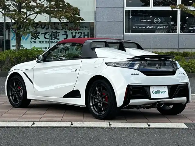 ホンダ Ｓ６６０ モデューロX バージョンZ 福島県 2021(令3)年 0.1万km プレミアムスターホワイトP Modulo X 特別仕様車（Version Z）/6F/特別仕様車専用装備/・専用ブラックアクティブスポイラー（ガーニーフラップ付）/・専用Version Zロゴ入りアルミ製コンソールプレート/・ブラックエンブレム/ModuloX共通装備/・専用スポーツレザーシート/（本革×ラックス スェード(R)/ボルドーレッド×ブラック/Modulo Xロゴ入り）/・本革巻ステアリングホイール/・チタン製シフトノブ×アルカンターラシフトブーツ/（グレーステッチ）/・専用アルカンターラ(R)×本革製サイドブレーキカバー/・グリル一体型専用フロントバンパー/・専用カラードドアミラー/・ロールトップ（ボルドーレッド）/・専用サスペンション（5段階減衰力調整機構付）/ModuloR15アルミホイール/純正ディスプレイオーディオ/「AM/FM/BT/HDMI」/バックカメラ/前席シートヒーター・クーラー/ETC/プッシュスタート/キーレスエントリー/取説・保証書・スペアキー有