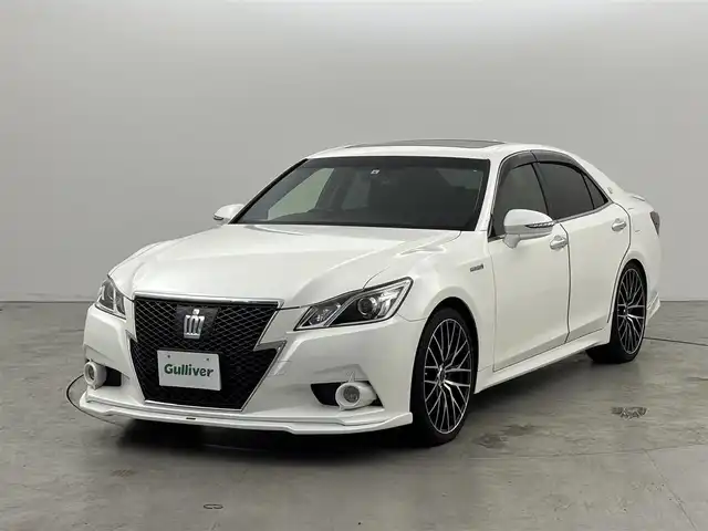 トヨタ クラウン ハイブリッド アスリートS 福岡県 2013(平25)年 6.1万km ホワイトパールクリスタルシャイン ムーンルーフ　/Ｆ／Ｒリップスポイラー　/純正ナビ／フルセグＴＶ　/バックカメラ　/前後ドライブレコーダー　/レーダー探知機　/レーダークルコン　/コーナーセンサー　/衝突軽減ブレーキ　/レーンキープ　/シートベンチレーション／ヒーター　/ＬＥＤヘッドライト　/サマータイヤ付きTRDアルミホイール積込