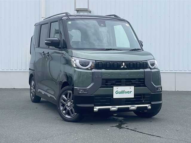 三菱 デリカミニ T プレミアム 三重県 2025(令7)年 0.1万km未満 ＤグリーンＭ 純正９型ディスプレイ　/届出済未使用車　/全周囲カメラ　/追従走行　/衝突軽減　/ダウンヒルアシストコントロール　/両側電動スライドドア　/シートヒーター　/ステアリングヒーター　/リアサーキュレーター　/ルーフレール/色コード　X42F29