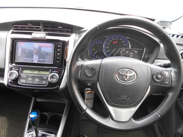 トヨタ カローラ フィールダー ハイブリッドG 栃木県 2015(平27)年 9.3万km スーパーレッドⅤ ワンオーナー/純正フルセグSDナビ/バックカメラ/ウィンカーミラー/プッシュスタート/ステアリングリモコン/プリクラッシュセーフティシステム/レーンディパーアラート/電動格納ミラー/純正フロアマット/社外15インチアルミホイール