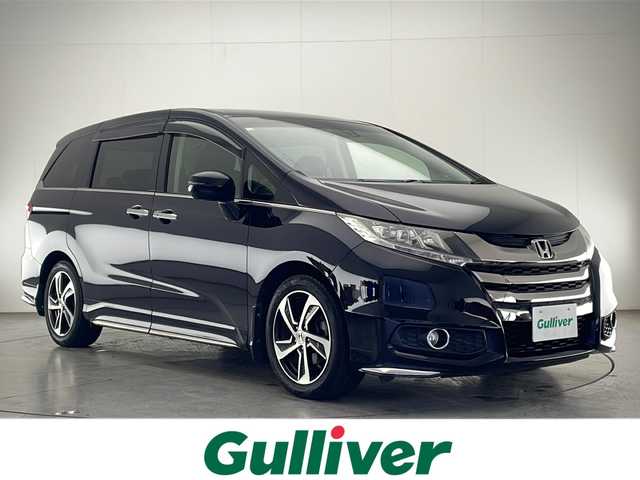 ホンダ オデッセイ アブソルート 宮崎県 2014(平26)年 7.4万km プレミアムヴィーナスブラックP 禁煙車/シティブレーキアシスト/社外ナビTV/（MDV-L401/CD/FMAM/ワンセグTV)/社外バックカメラ/純正ビルトインETC/純正17インチアルミ/純正LEDオートライト/純正フォグ/純正フロアマット/両側電動スライドドア/ウインカードアミラー/パドルシフト/オートエアコン/本革巻ハンドル/黒木目調パネル/スマートキー/プッシュエンジンスタート/新車時保証書/取扱い説明書